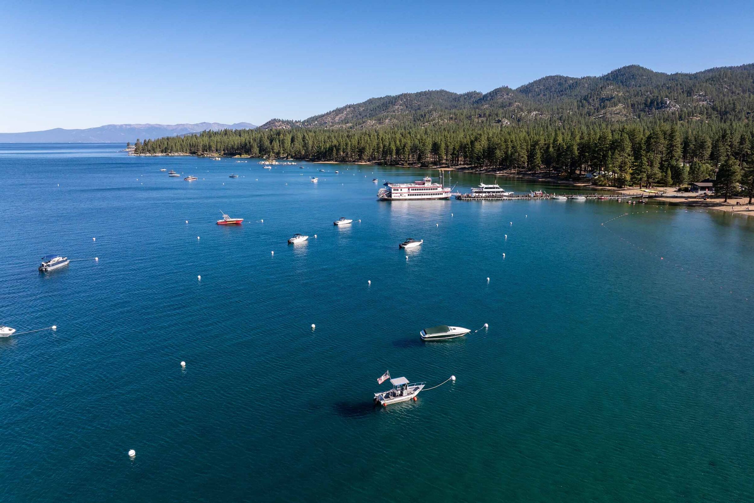 Aerial view of Lake Tahoe, Nevada, USA, and its surrounding forests.